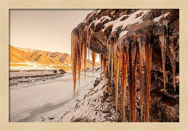 Winter Icicles Hanging From Rock