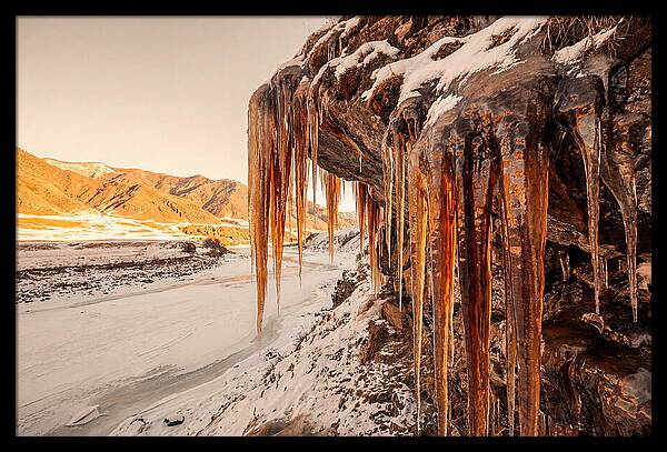 Winter Icicles Hanging From Rock