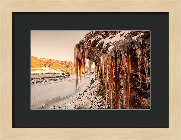 Winter Icicles Hanging From Rock