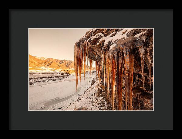 Winter Icicles Hanging From Rock