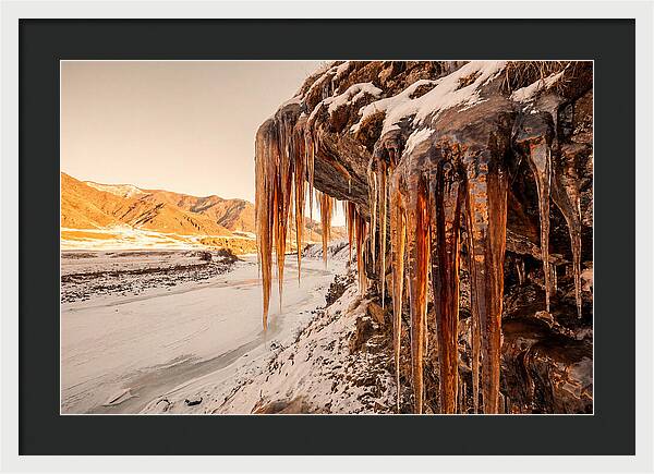 Winter Icicles Hanging From Rock
