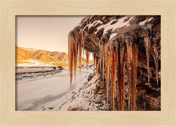 Winter Icicles Hanging From Rock