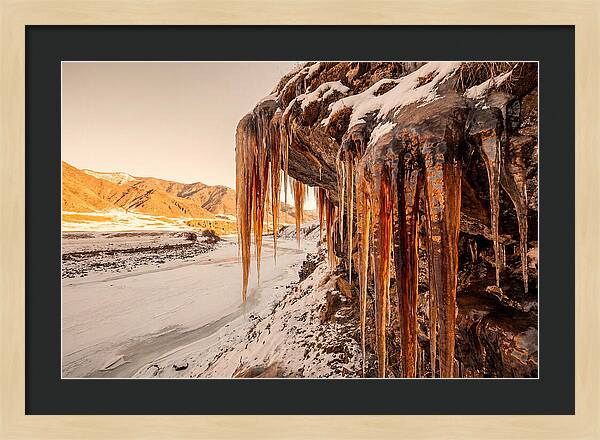Winter Icicles Hanging From Rock