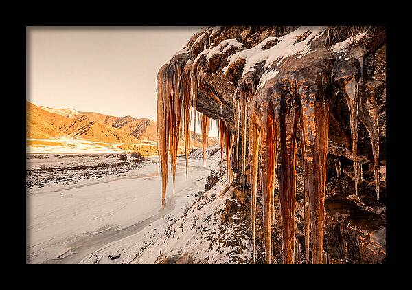Winter Icicles Hanging From Rock
