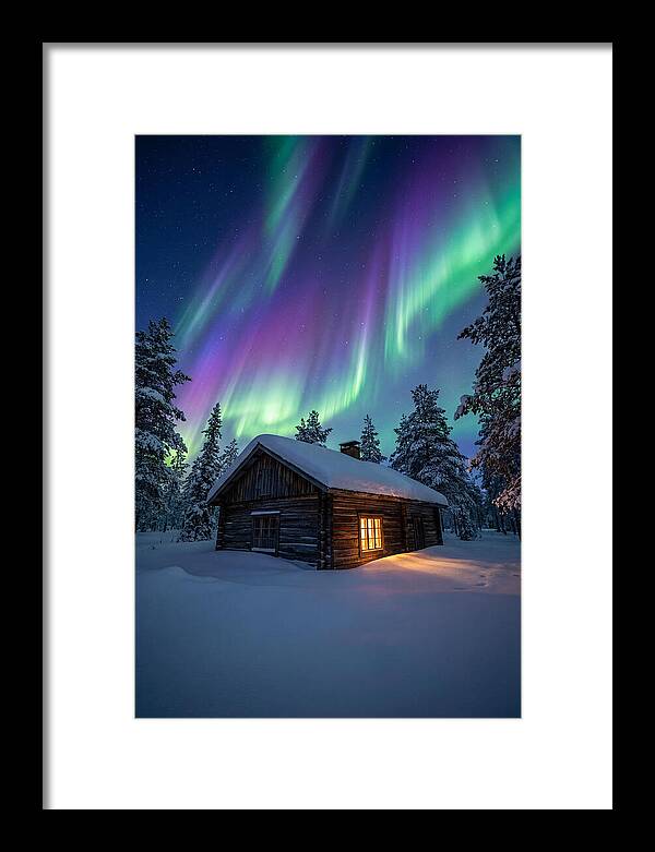 Winters Embrace Under Northern Lights