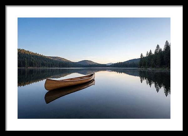 Wooden Canoe On Still Lake
