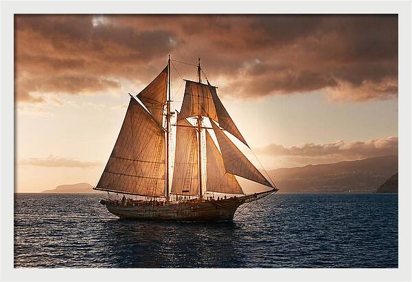 Wooden Sailboat Under Full Sail