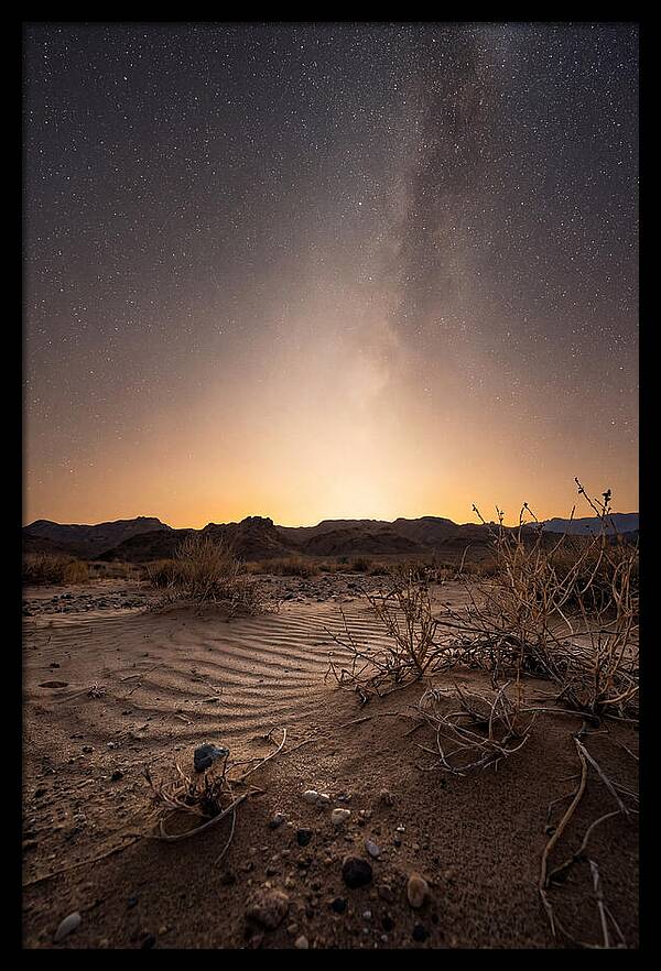 Zodiacal Light Over Desert Landscape