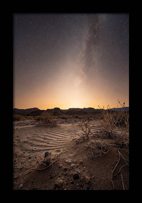 Zodiacal Light Over Desert Landscape