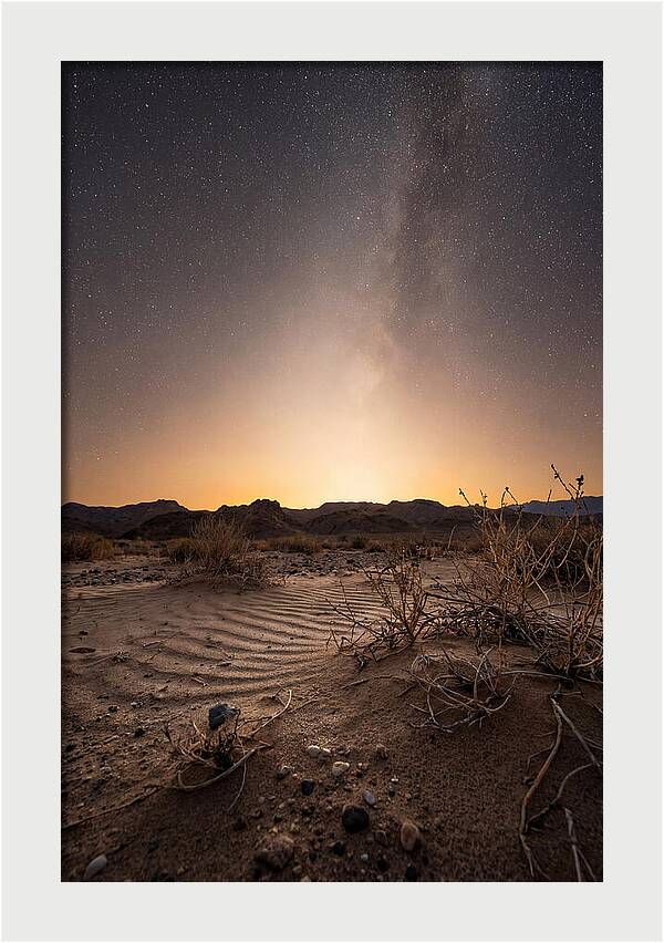 Zodiacal Light Over Desert Landscape
