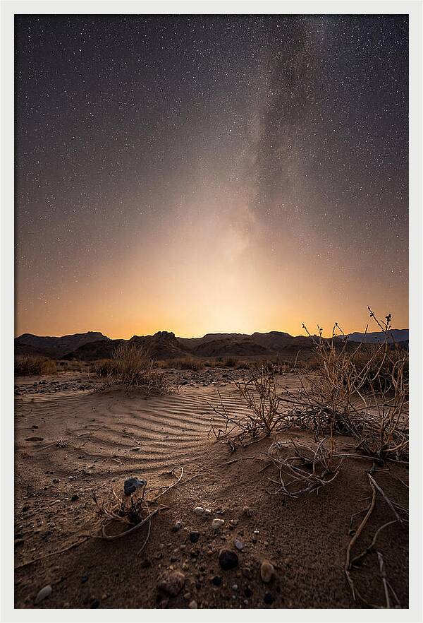 Zodiacal Light Over Desert Landscape